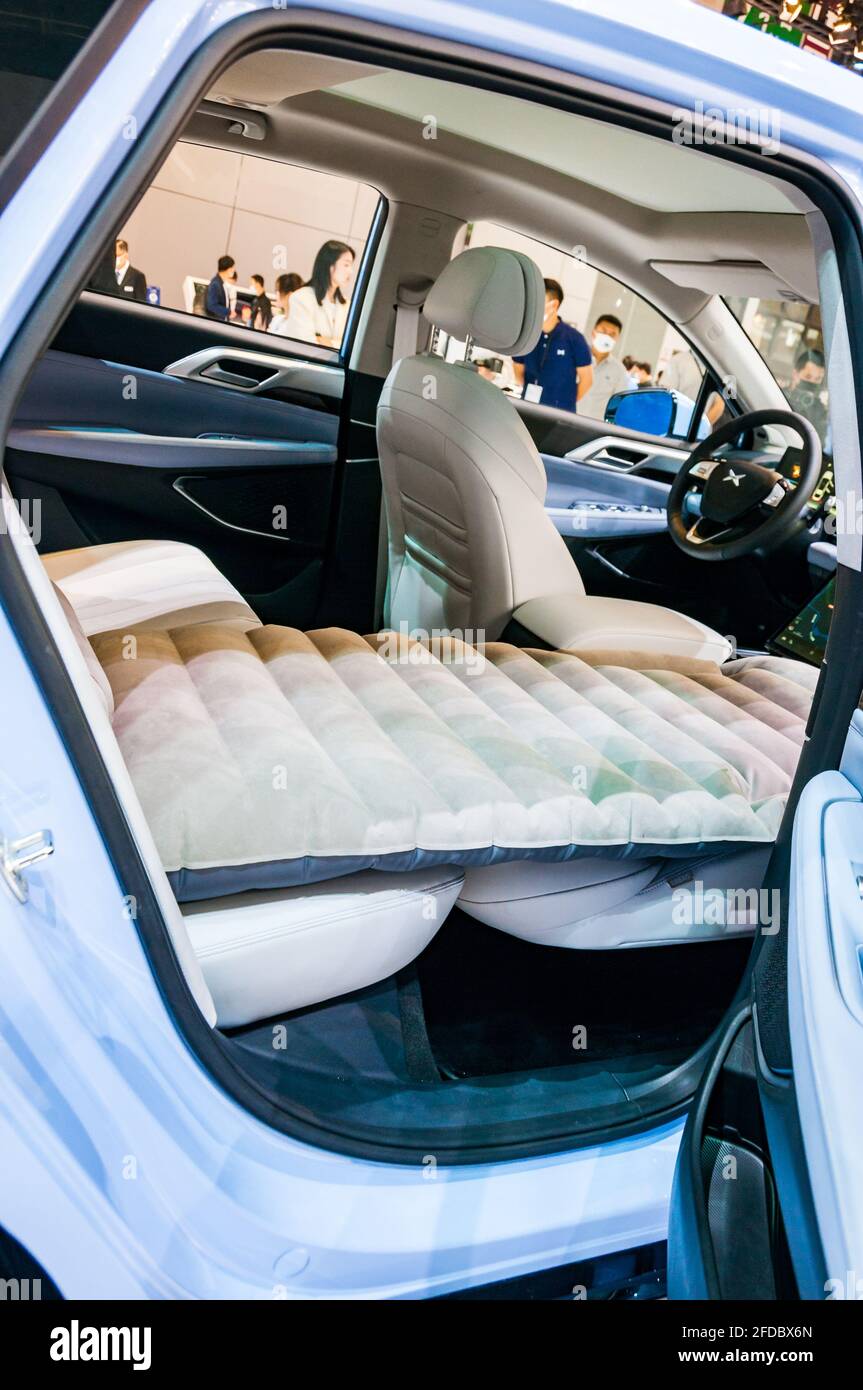 Interior of the Xpeng P5 showing sleep mode on display at the 2021