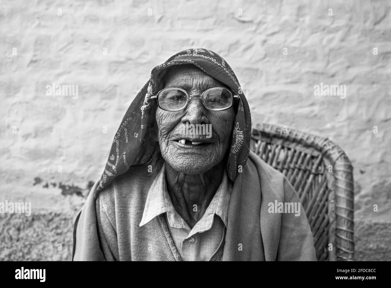 black and white portrait of senior indian woman,having wrinkles on her face. Stock Photo