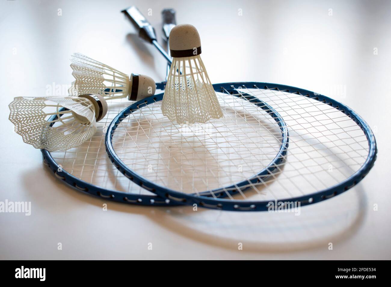 Badminton set - two racquets and shuttlecocks Stock Photo