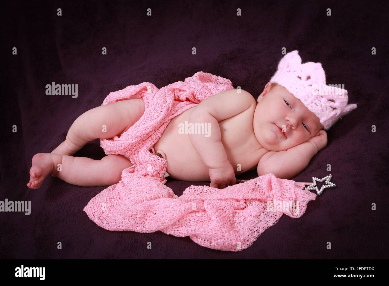 Newborn baby girl on a soft blanket Stock Photo Alamy