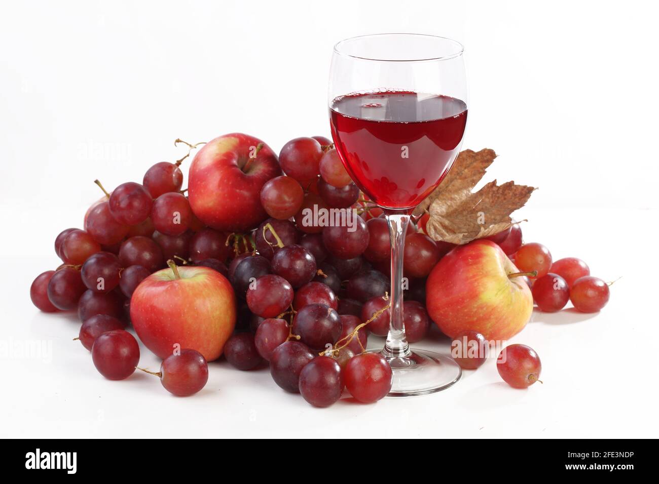 Still life with wine and fruits on a white background Stock Photo - Alamy