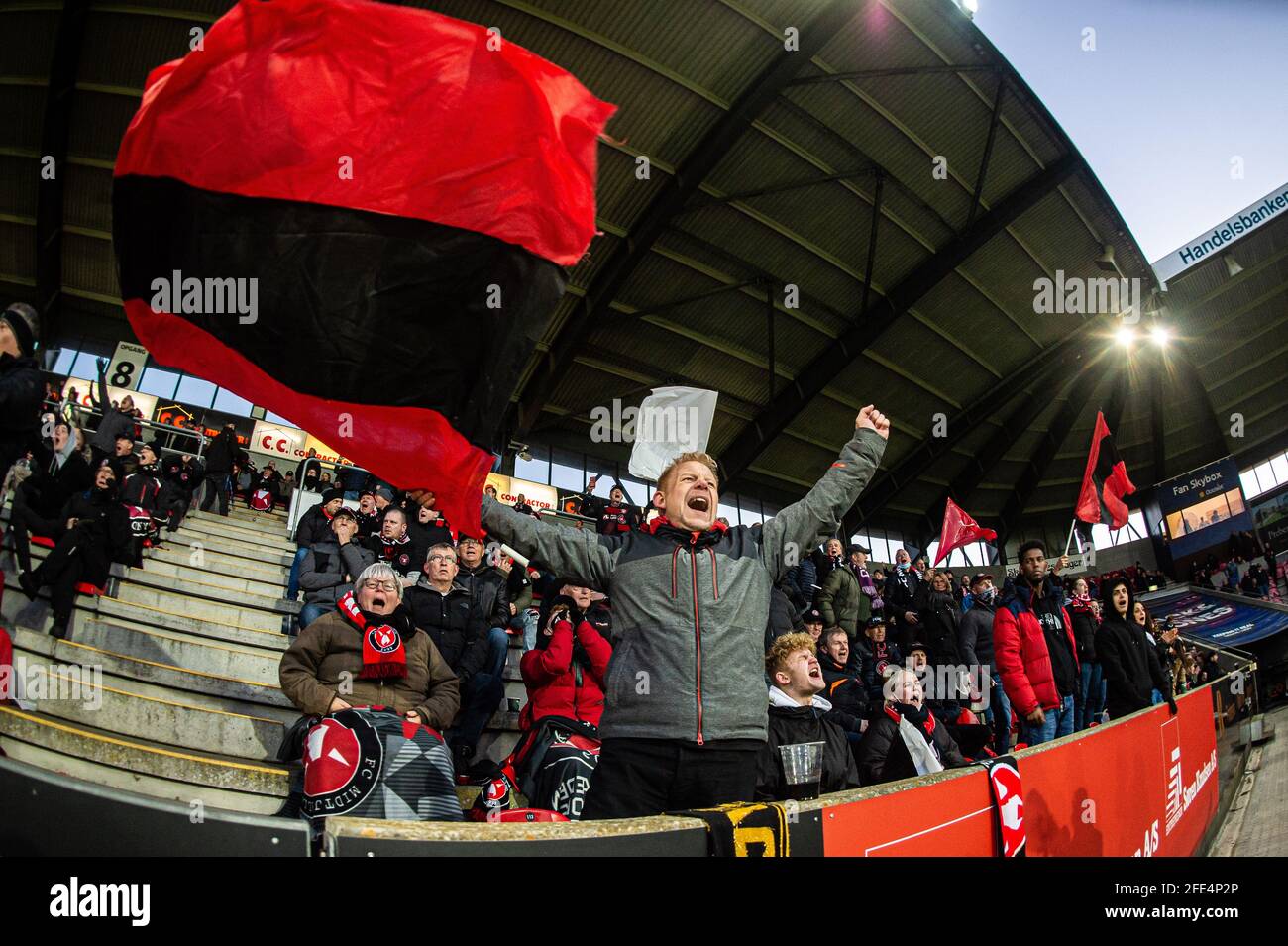 Herning, Denmark. 22nd, April 2021. Football fans of FC Midtjylland  celebrate af goal at MCH Arena during the 3F Superliga match between FC  Midtjylland and FC Copenhagen in Herning. (Photo credit: Gonzales