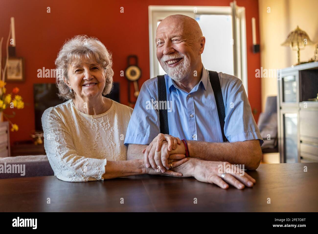 Happy senior couple together at home Stock Photo