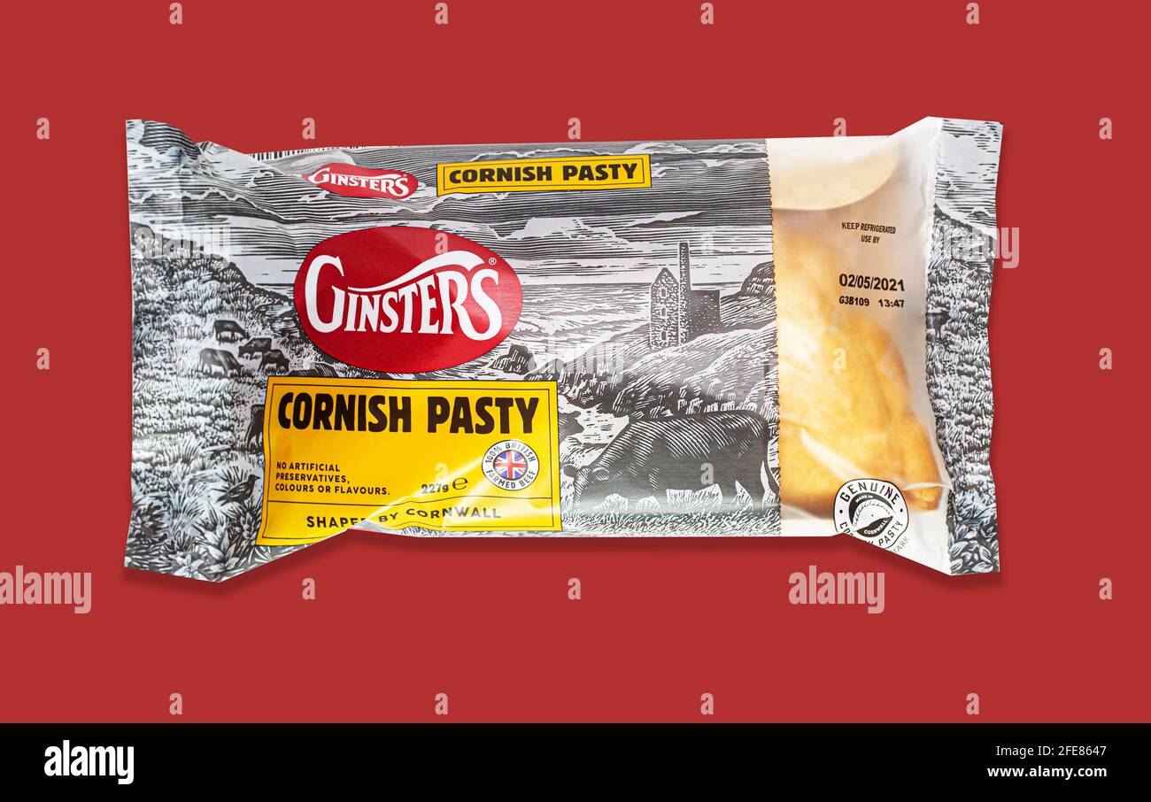 SWINDON, UK - APRIL 24, 2021:  Ginsters Cornish Pasty on a red  background Stock Photo