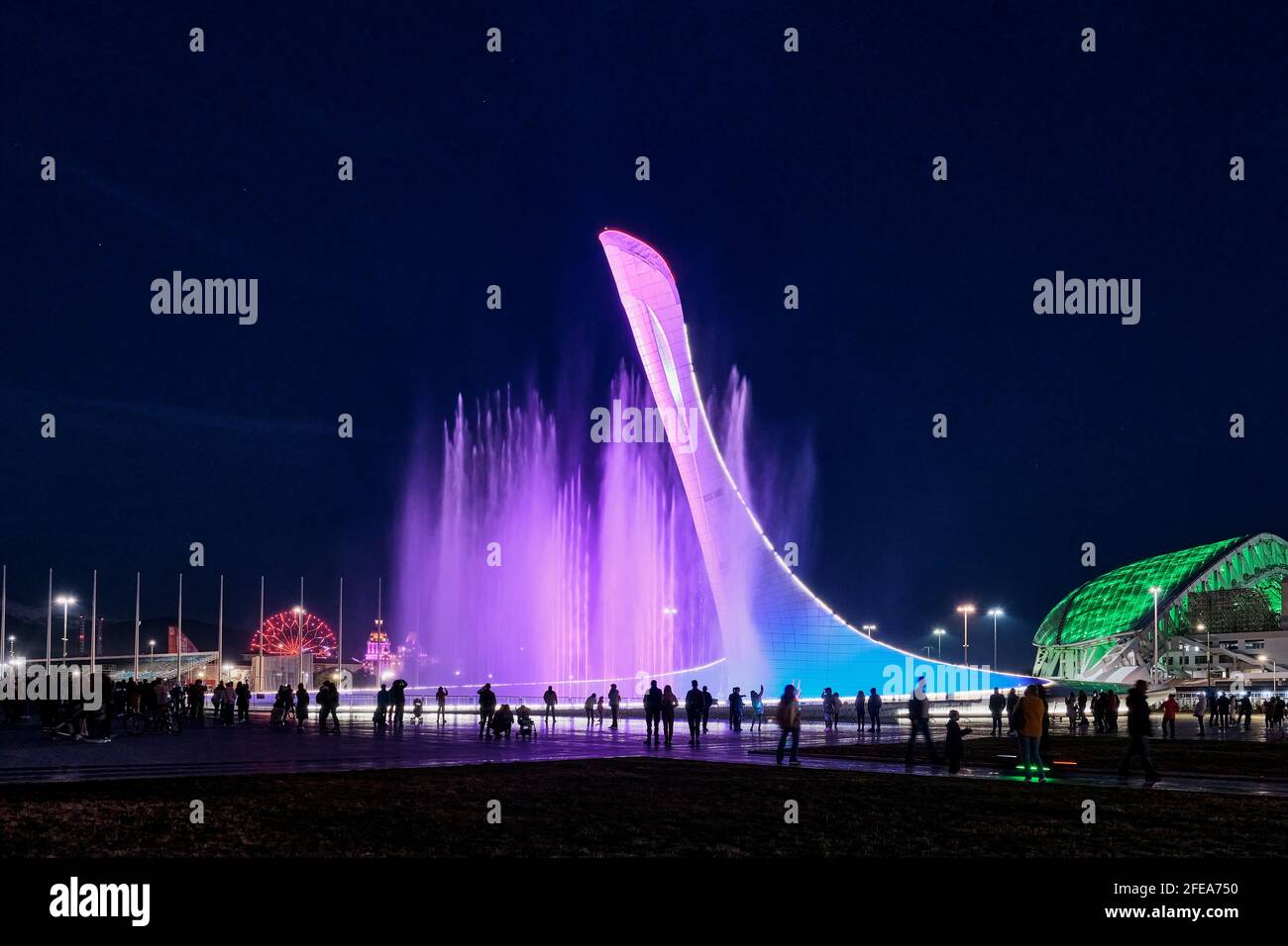 Evening show of singing fountains in the Olympic Park Sochi. Sculpture