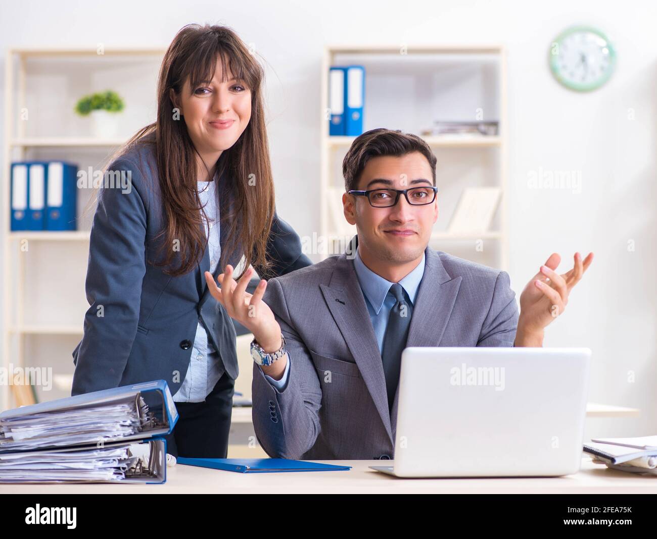 The man and woman working in the office Stock Photo - Alamy