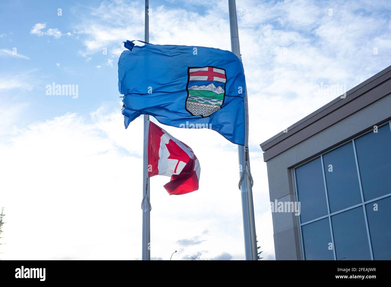 Canadian Flag and Alberta Provincial Flag at Half Mast Stock Photo Alamy