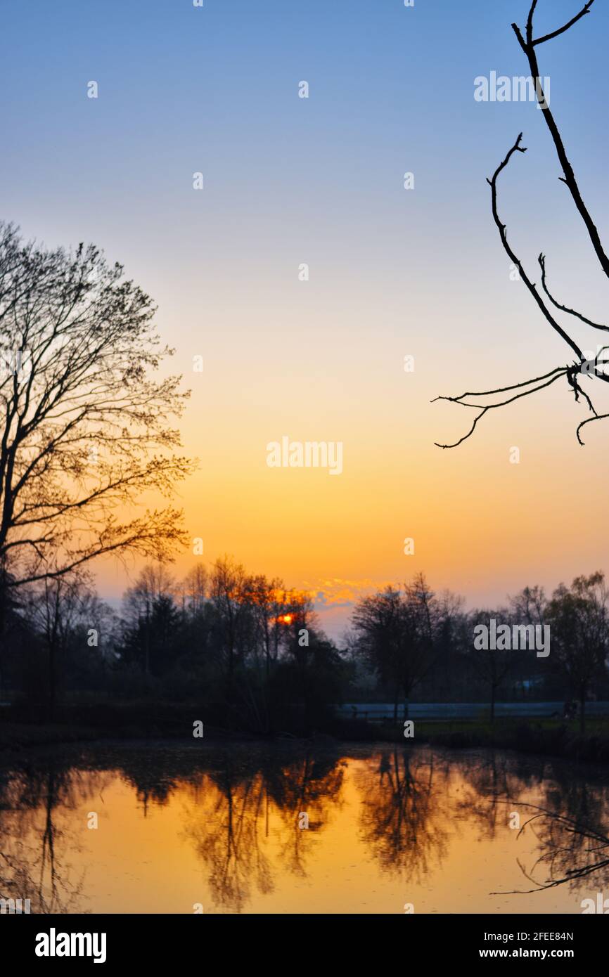 amazing sunset on the Muzza river Stock Photo - Alamy