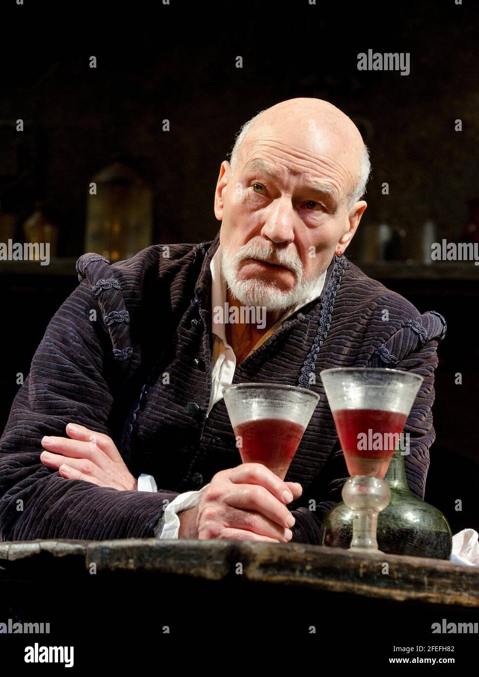 Patrick Stewart (as William Shakespeare) in BINGO by Edward Bond at the Young Vic, London SE1  23/02/2012  design: Robert Innes Hopkins  lighting: Tim Mitchell  director: Angus Jackson Stock Photo