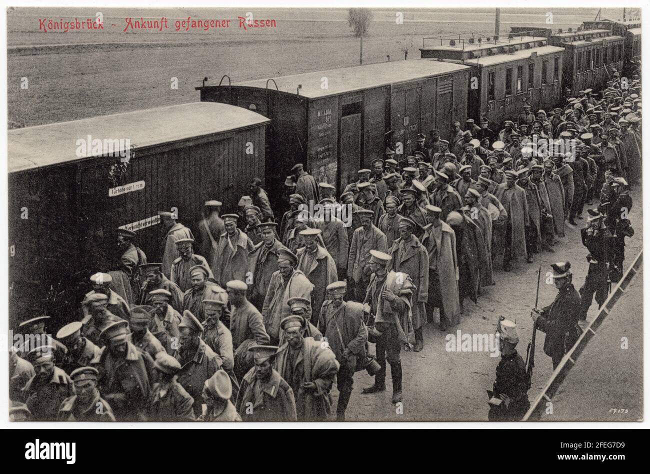 Arrival of Russian prisoners of war to the German POW Camp Königsbrück during the First World War (now Königsbrück, Saxony, Germany) depicted in the black and white vintage photograph by German photographer Carl Schmidt dated from 1914 to 1918 and issued as a postcard. Text in German means: Arrival of Russian prisoners. Courtesy of the Azoor Photo Collection. Stock Photo