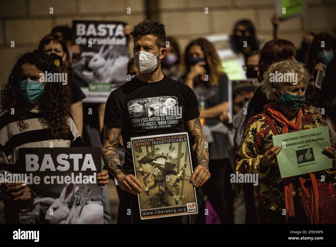 Barcelona, Spain. 24th Apr, 2021. Activists hold placards demanding the closure of animal testing lab 'vivotecnia' during an animal rights protest staged in Barcelona Credit: Matthias Oesterle/Alamy Live News Stock Photo