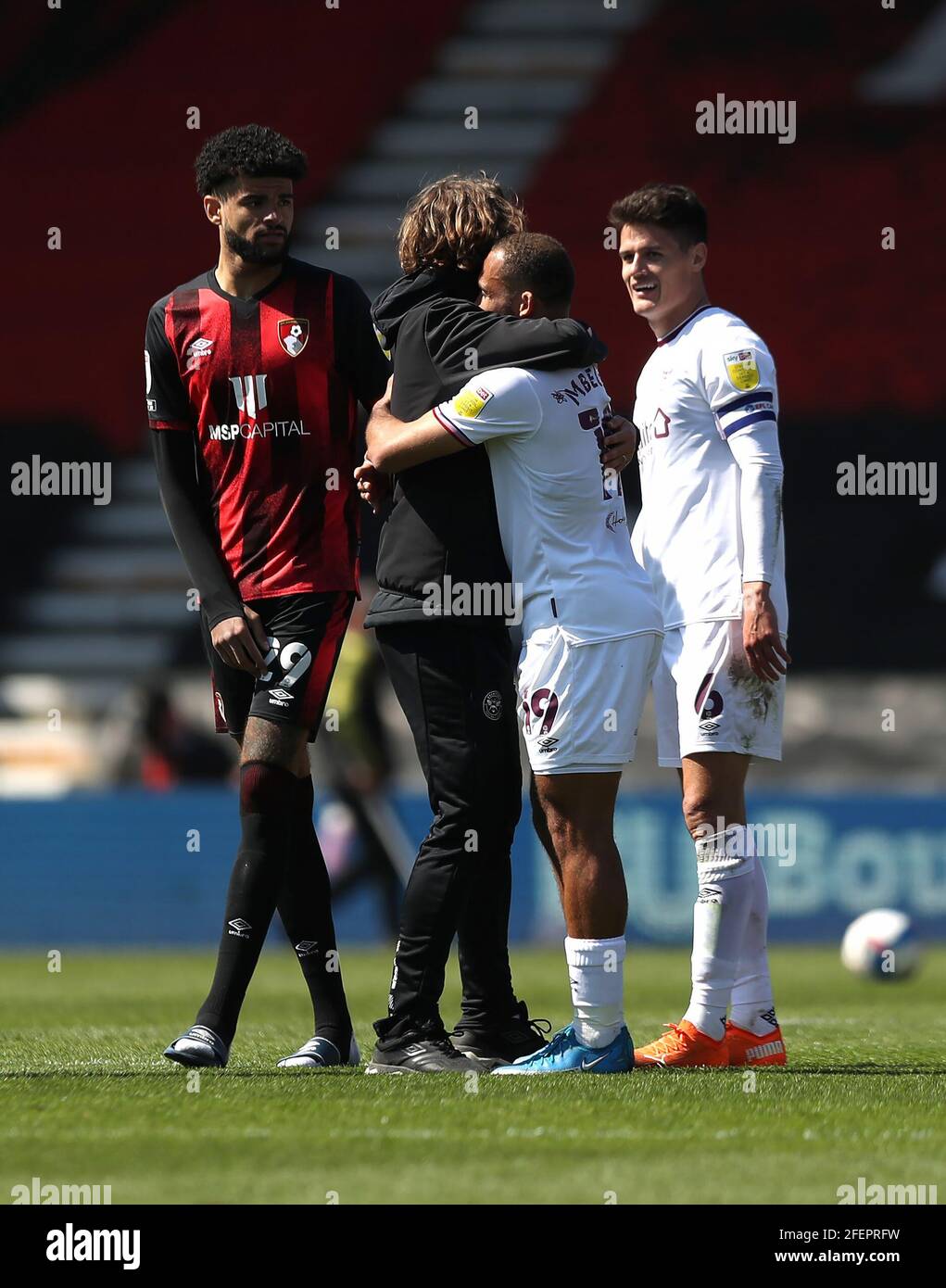 Brentford manager Thomas Frank greets Brentford's Bryan Mbeumo after the final whistle during the Sky Bet Championship match at Vitality Stadium, Bournemouth. Picture date: Saturday April 24, 2021. Stock Photo
