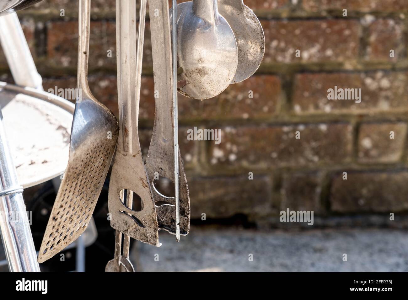 Epsom Surrey, London England UK, April 23 2021, A Collection Of Stainless Steel BBQ Cooking Utensils With No People On A Sunny Day Stock Photo