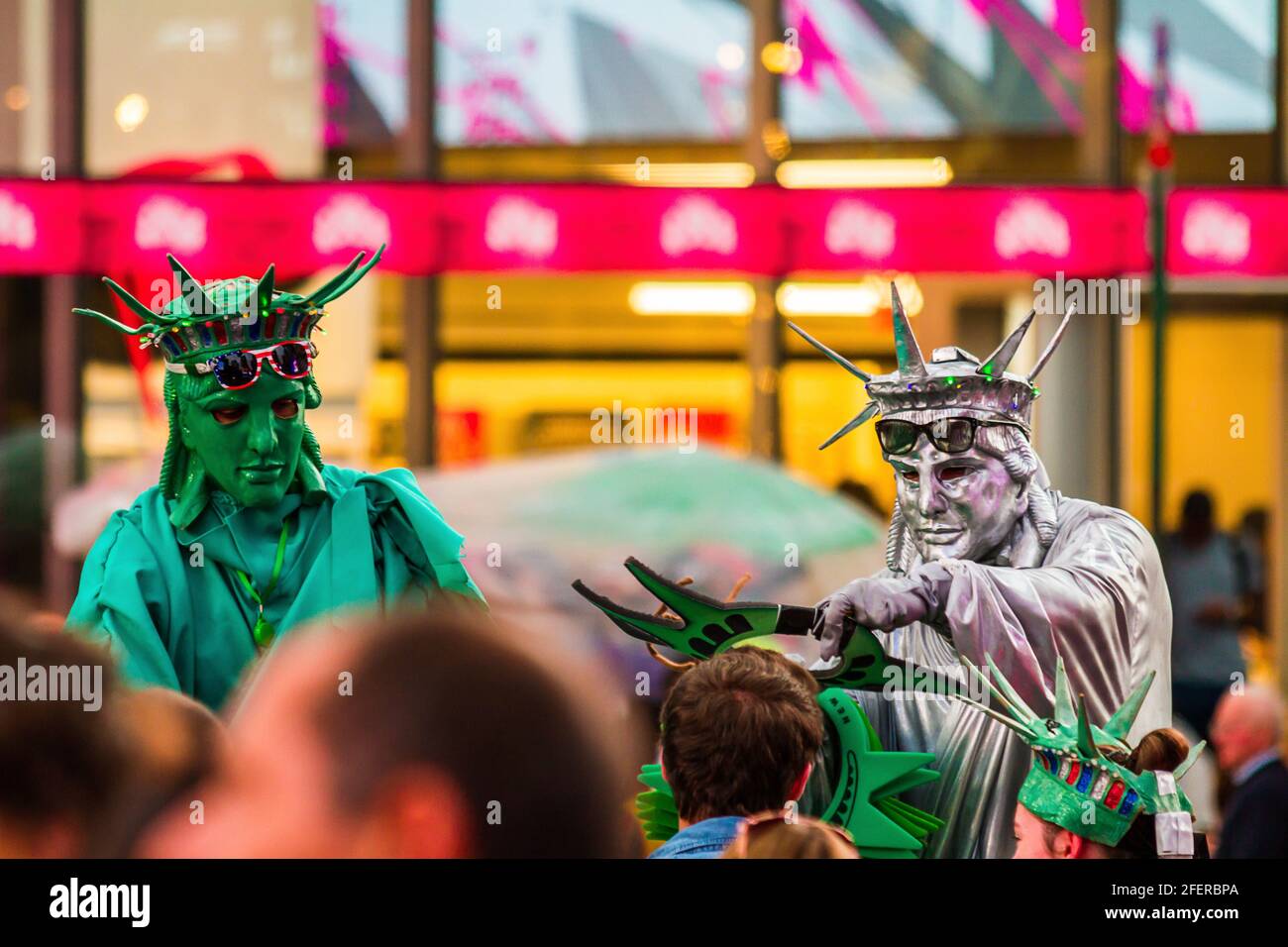 Two men performing in Statue of Liberty costume at Times Square Stock Photo