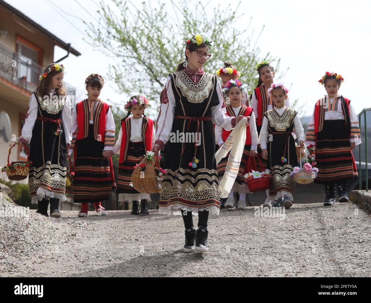 Lazarki day is a Bulgarian traditional festive day. Girls who became women during the last year are called Lazarki. The girls decorate in a colorful Stock Photo