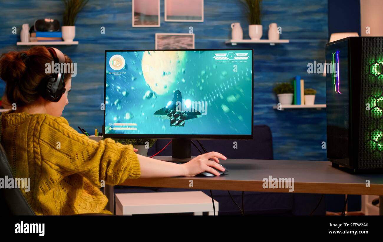 Professional pro gamer playing space shooter video game new graphics on  powerful computer from home. Virtual shooter game in cyberspace, esports  player performing on pc gaming tournament Stock Photo - Alamy