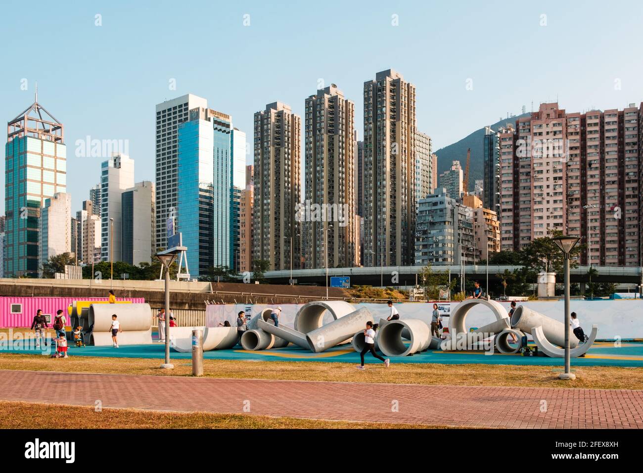 Hong Kong, November, 2019: Kids playing outdoor on public playground in city of Hong Kong Stock Photo