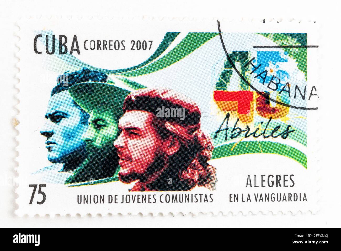 Vintage 'Cuba Correos' stamp with the Che Guevara image. Year 2007.  45th Anniversary of the UJC or Union of Communist Youth. Che appears alongside Ca Stock Photo