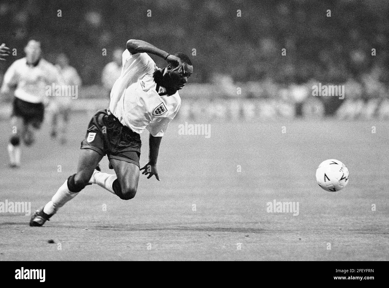 England v Romania playing an international friendly 12th October 1994 at Wembley. Englands Ian Wright comes away with the ball after Romania Tibor Selymes trys to obtain possession.This image is bound by Dataco restrictions on how it can be used. EDITORIAL USE ONLY No use with unauthorised audio, video, data, fixture lists, club/league logos or “live” services. Online in-match use limited to 120 images, no video emulation. No use in betting, games or single club/league/player publications Stock Photo