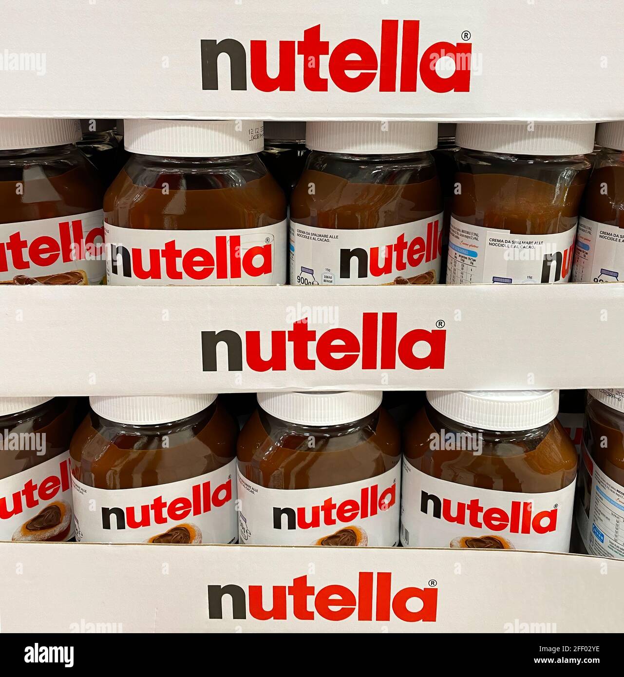 Nutella hazelnut spread jars in shelf of an italian supermarket. Nutella is  a famous brand by italian Ferrero compan Stock Photo - Alamy