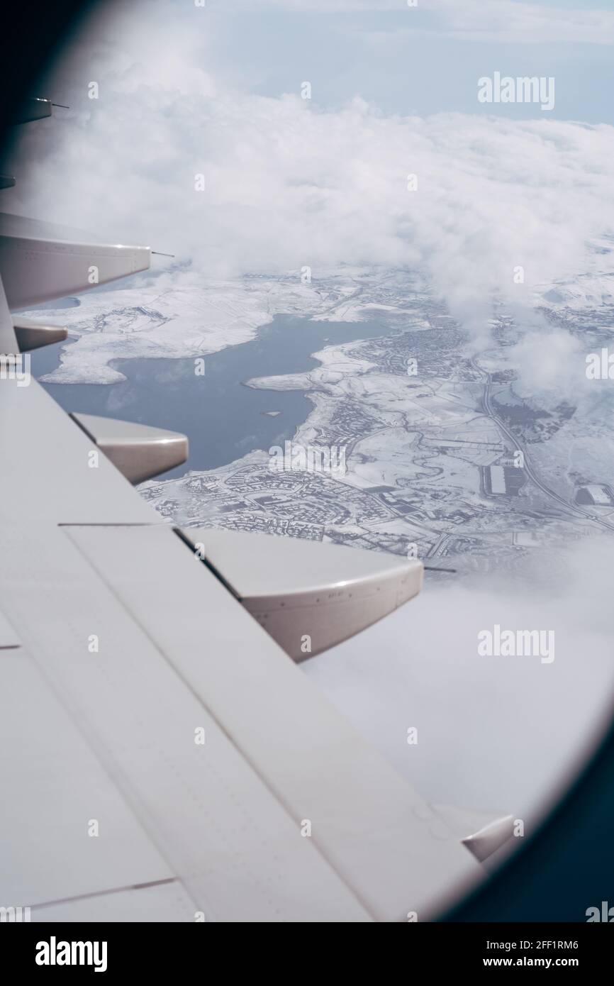 Iceland covered with snow from the airplane window Stock Photo - Alamy