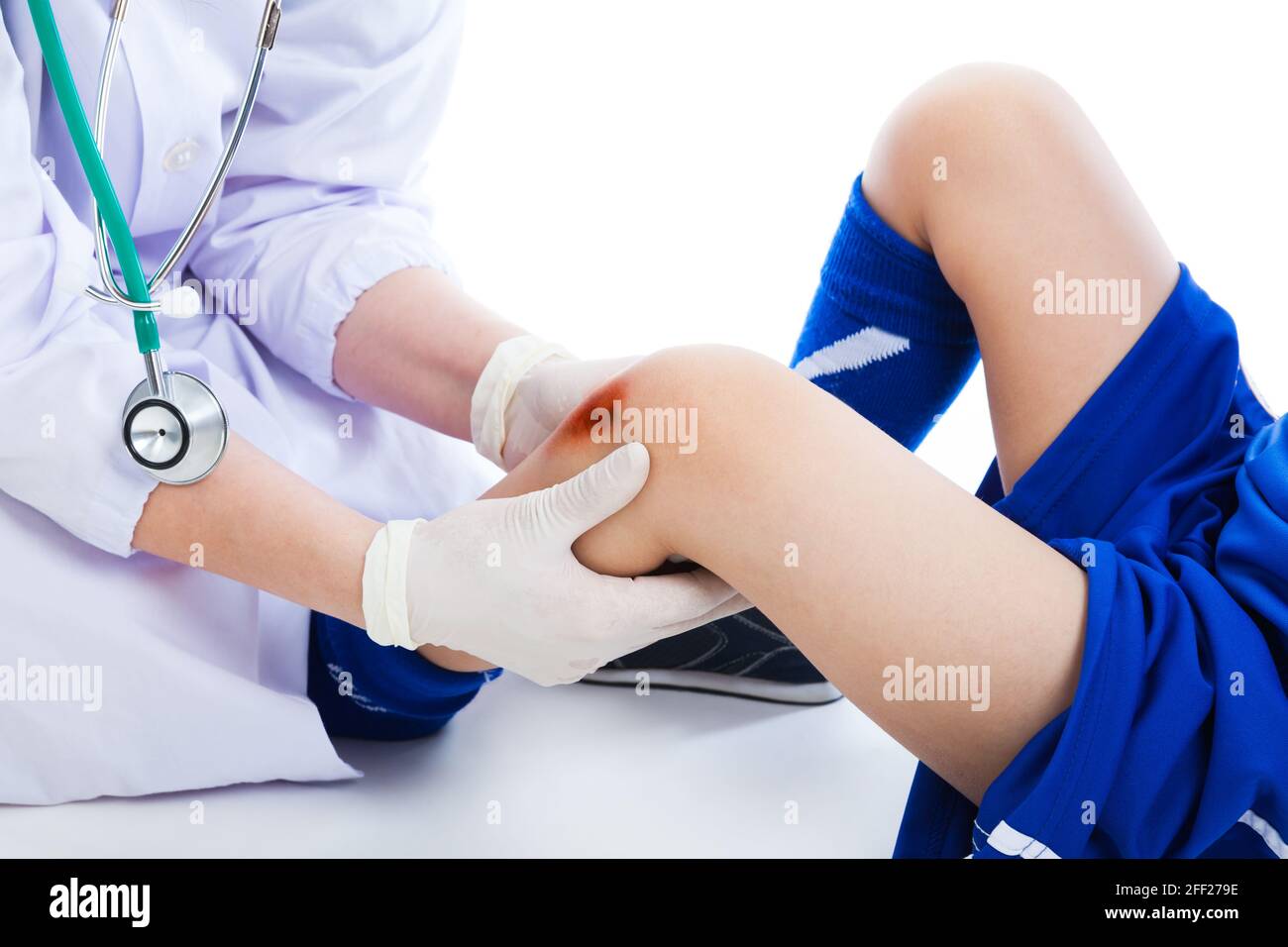 Close up doctor examining a patient suffering from injured with a bruise. Sport injury