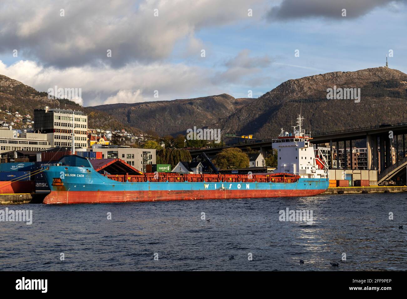 Container vessel Wilson caen at Frieleneskaien terminal,  in the port of Bergen, Norway Stock Photo