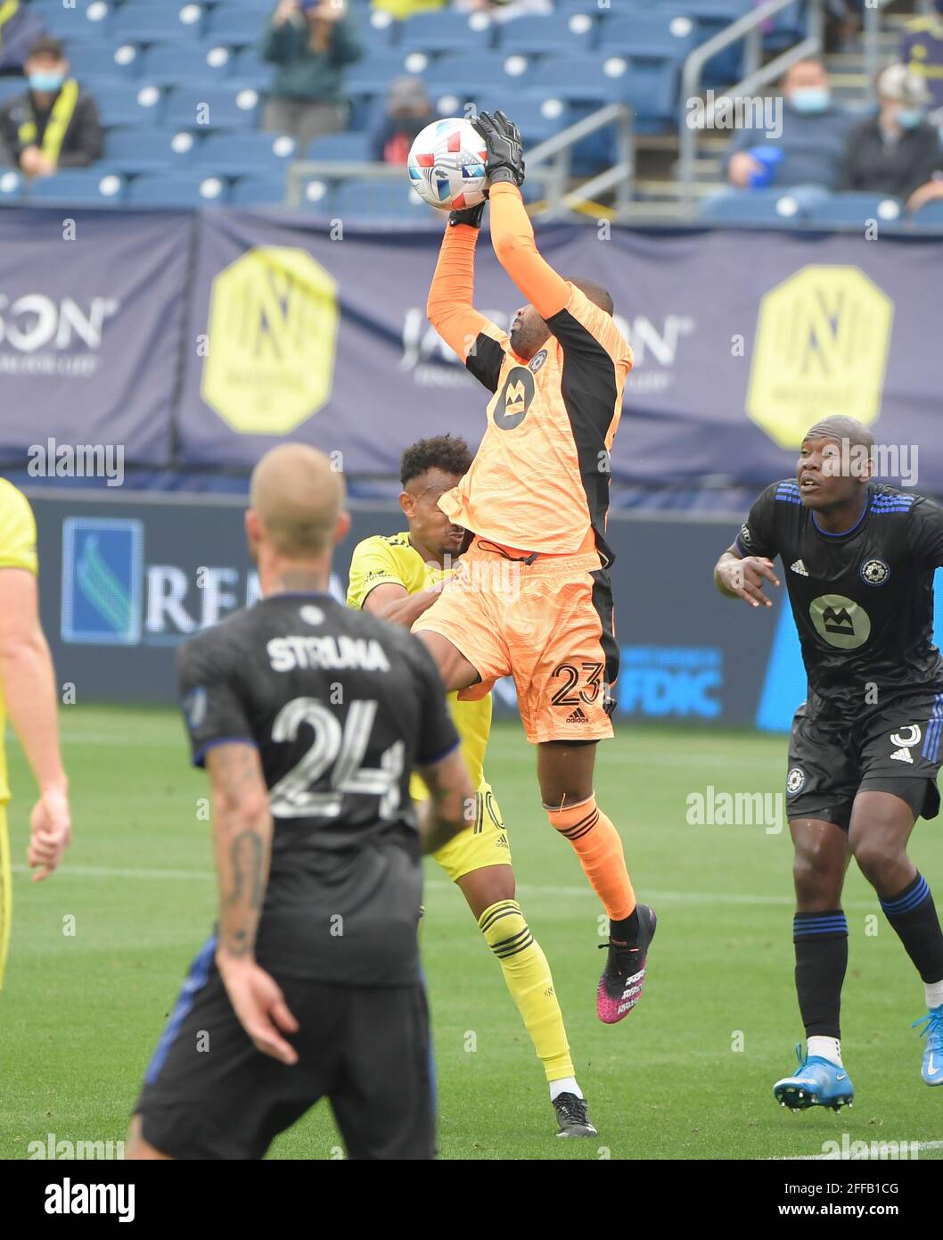Nashville TN, USA. 24th Apr, 2021. CF MontrŽal goalkeeper Clement Diop (23) blocks the ball against the Nashville SC during the first half of an MLS game between the FC Montreal and the Nashville SC at Nissan Stadium in Nashville TN. Credit: csm/Alamy Live News Stock Photo