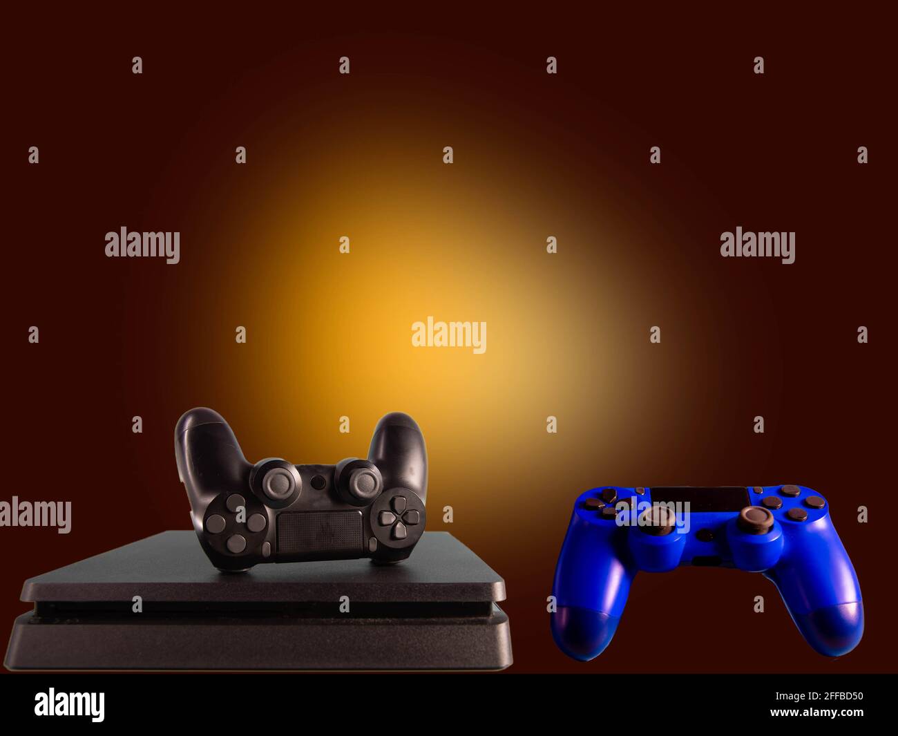 Video game controls on the dark background. Electronic game accessories. State-of-the-art controllers. Gamer commands. Electronic objects. Stock Photo