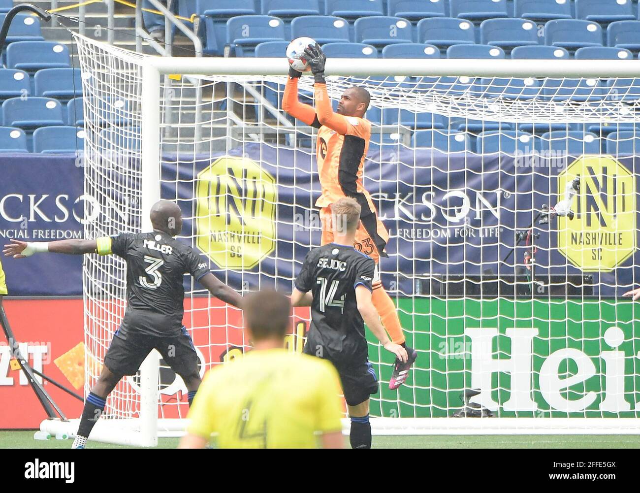 Nashville TN, USA. 24th Apr, 2021. CF MontrŽal goalkeeper Clement Diop (23) grabs the ball against the Nashville SC during the second half of an MLS game between the FC Montreal and the Nashville SC at Nissan Stadium in Nashville TN. Credit: csm/Alamy Live News Stock Photo