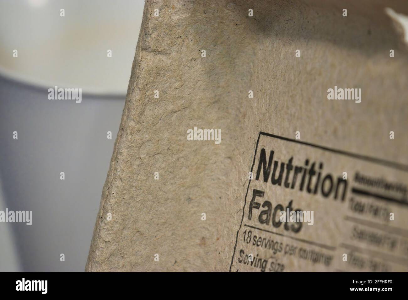 egg carton lid with the words nutritional facts printed on the inside Stock Photo