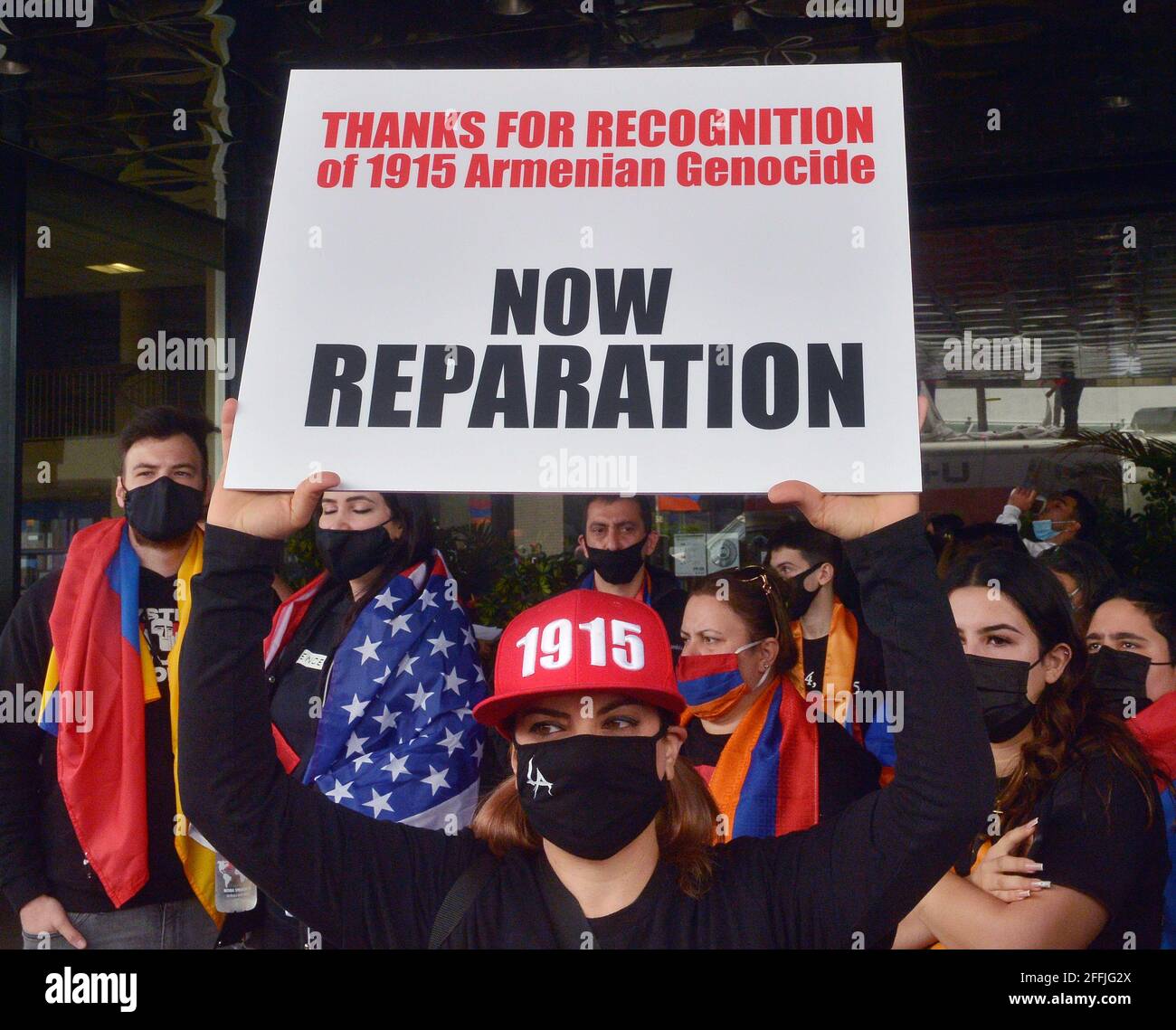 Los Angeles, United States. 24th Apr, 2021. Hundreds of people gather at the Turkish Consulate to mark the 106th anniversary of the beginning of the mass killing of Armenians by Turkish forces during WW I, and to celebrate President Joe Biden's formal recognition of the atrocities as genocide in Los Angeles on Saturday, April 24th, 2021. Biden became the first U.S. president to acknowledge the mass killings of Armenians in the early 20th century as genocide, fulfilling a long lobbying effort by the Armenian-American community. Photo by Jim Ruymen/UPI Credit: UPI/Alamy Live News Stock Photo
