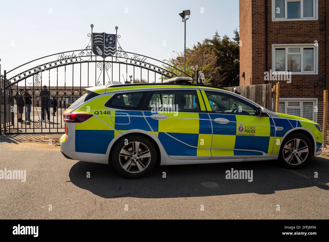 Police attending at a protest against the chairman Ron Martin outside the Roots Hall stadium of Southend Utd Football Club, Essex, UK. Entrance gate Stock Photo