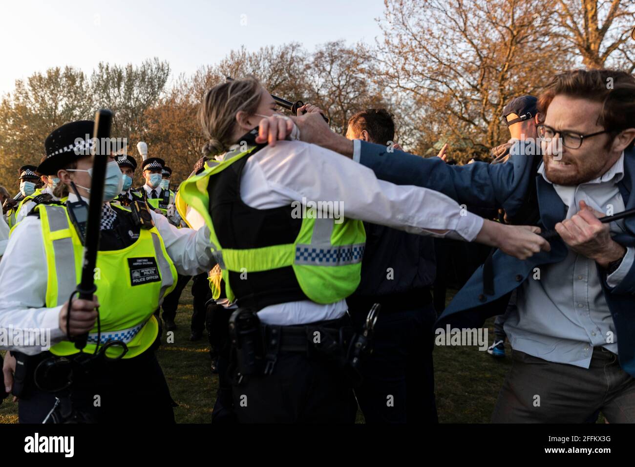 London, UK. 24th Apr, 2021. Police and protesters clash after the protest at Hyde Park. People called online to a flash mob-style mass gathering against vaccine passport, face masks and lockdown. The government aims to provide official proof of vaccination for millions of British holidaymakers this summer starting as early as May 17th. Credit: May James/ZUMA Wire/Alamy Live News Stock Photo