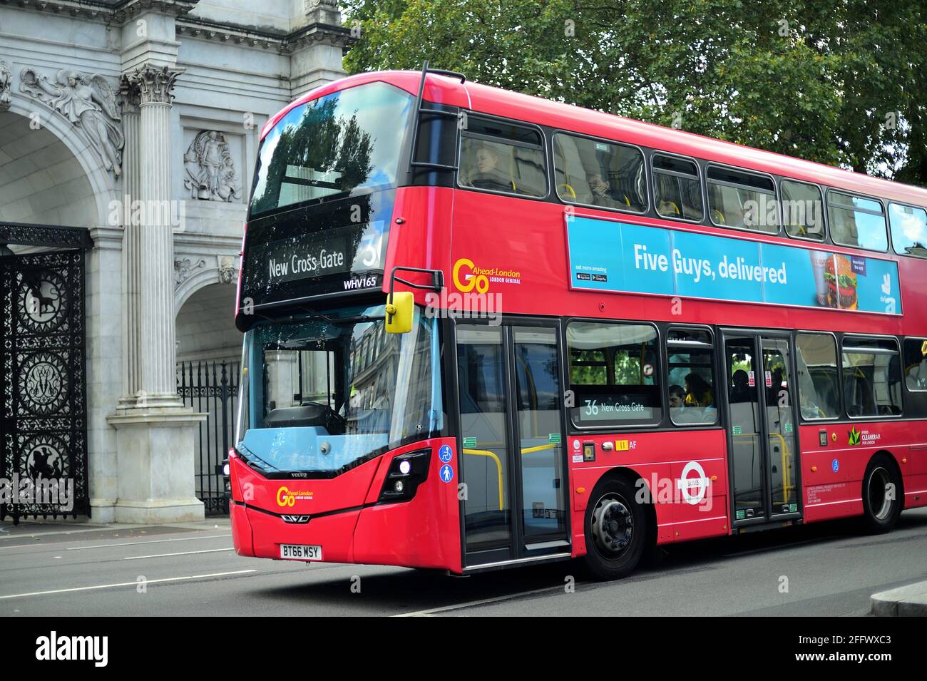 London England United Kingdom A Double Decker Bus Passing By Marble Arch Red Double Decker Buses Have Long Been A Recognizable Symbol Of London Stock Photo Alamy
