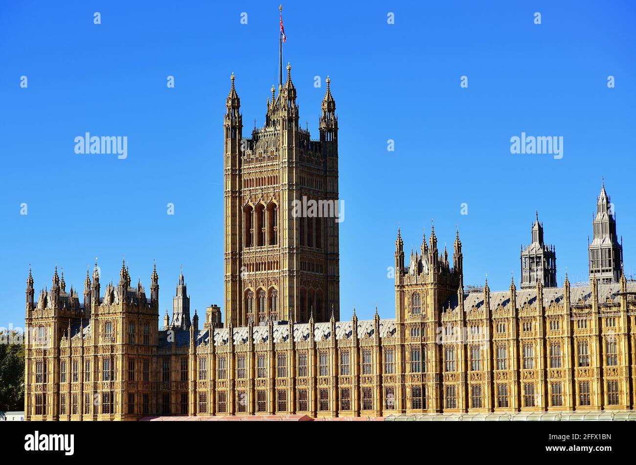 London, England, United Kingdom. Victoria Tower and the Houses of Parliament. Victoria Tower sits at the House of Lords end of the structure. Stock Photo