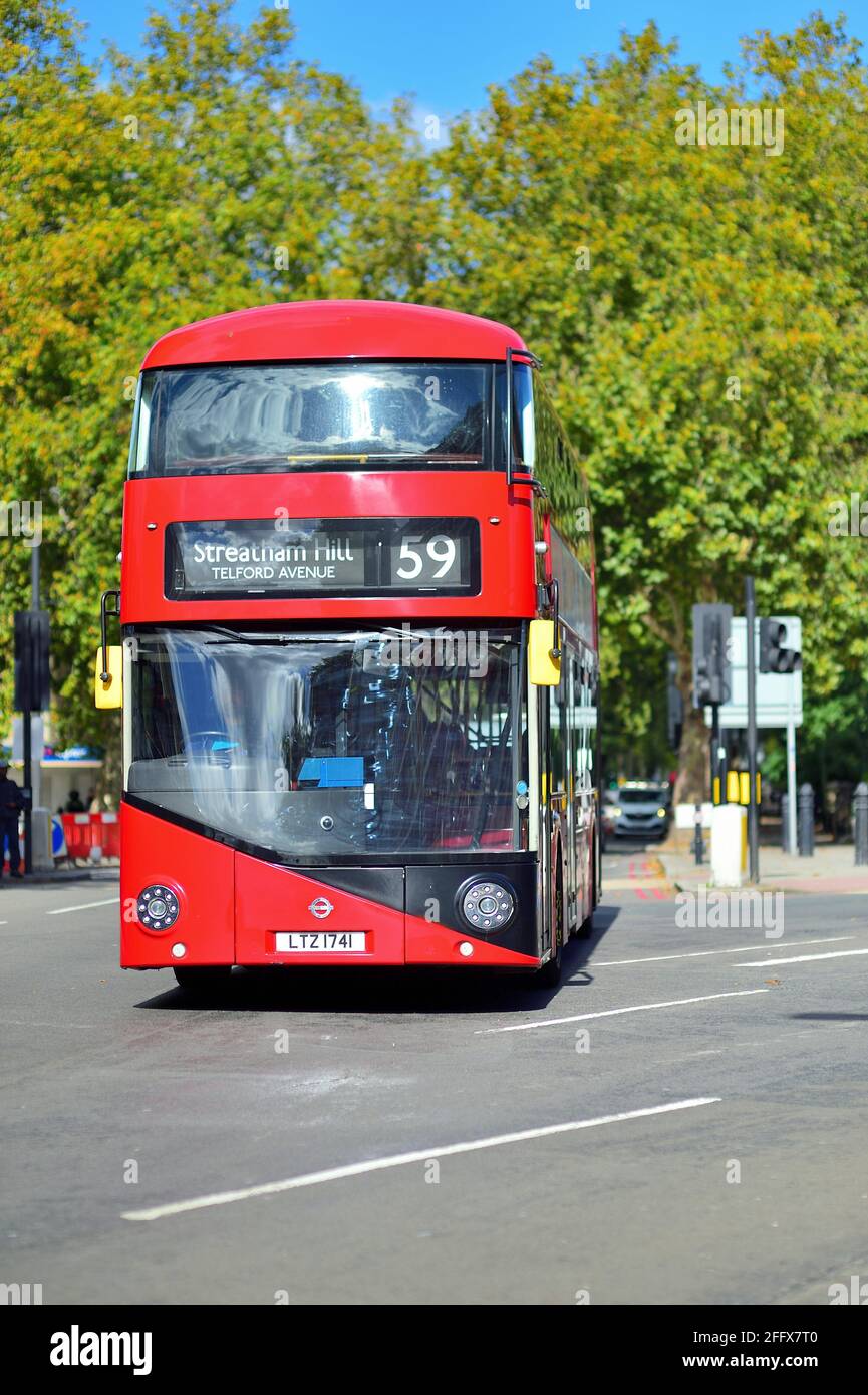 London, England, United Kingdom. Double-decker bus negotiating through a Lambeth intersection on its route to Streatham Hill also in Lambeth. Stock Photo