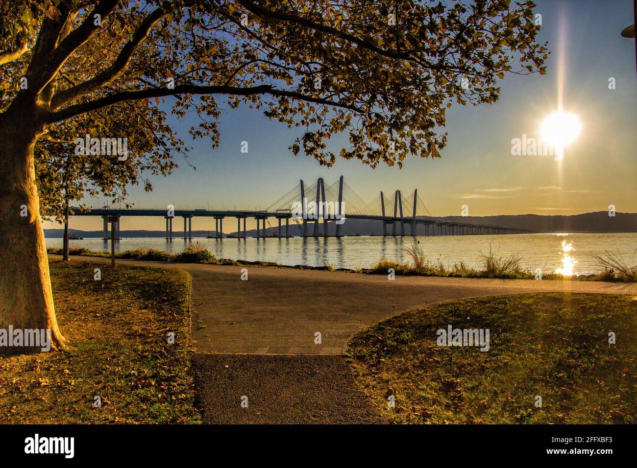 Tarrytown, NY / United States - Sept. 19, 2019: a landscape image of Pierson Park at sunset over the Hudson River. Stock Photo