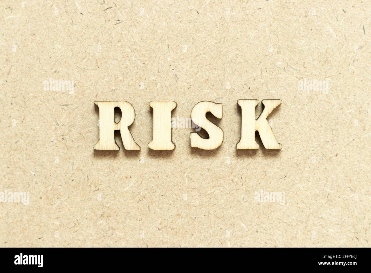Alphabet letter in word risk on wood background Stock Photo - Alamy