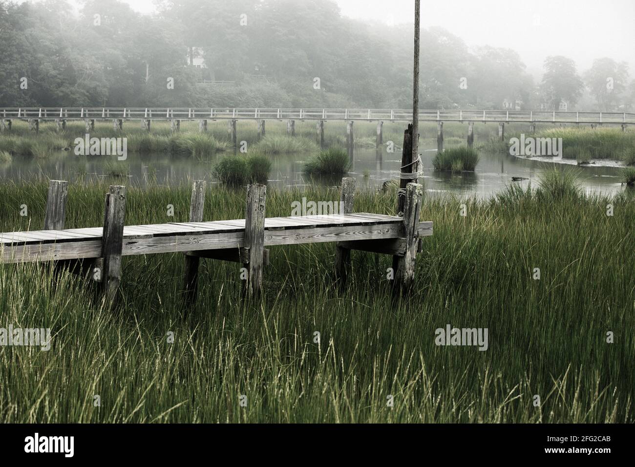 Foggy view of bridge on Cape Cod near Wellfleet MA Stock Photo
