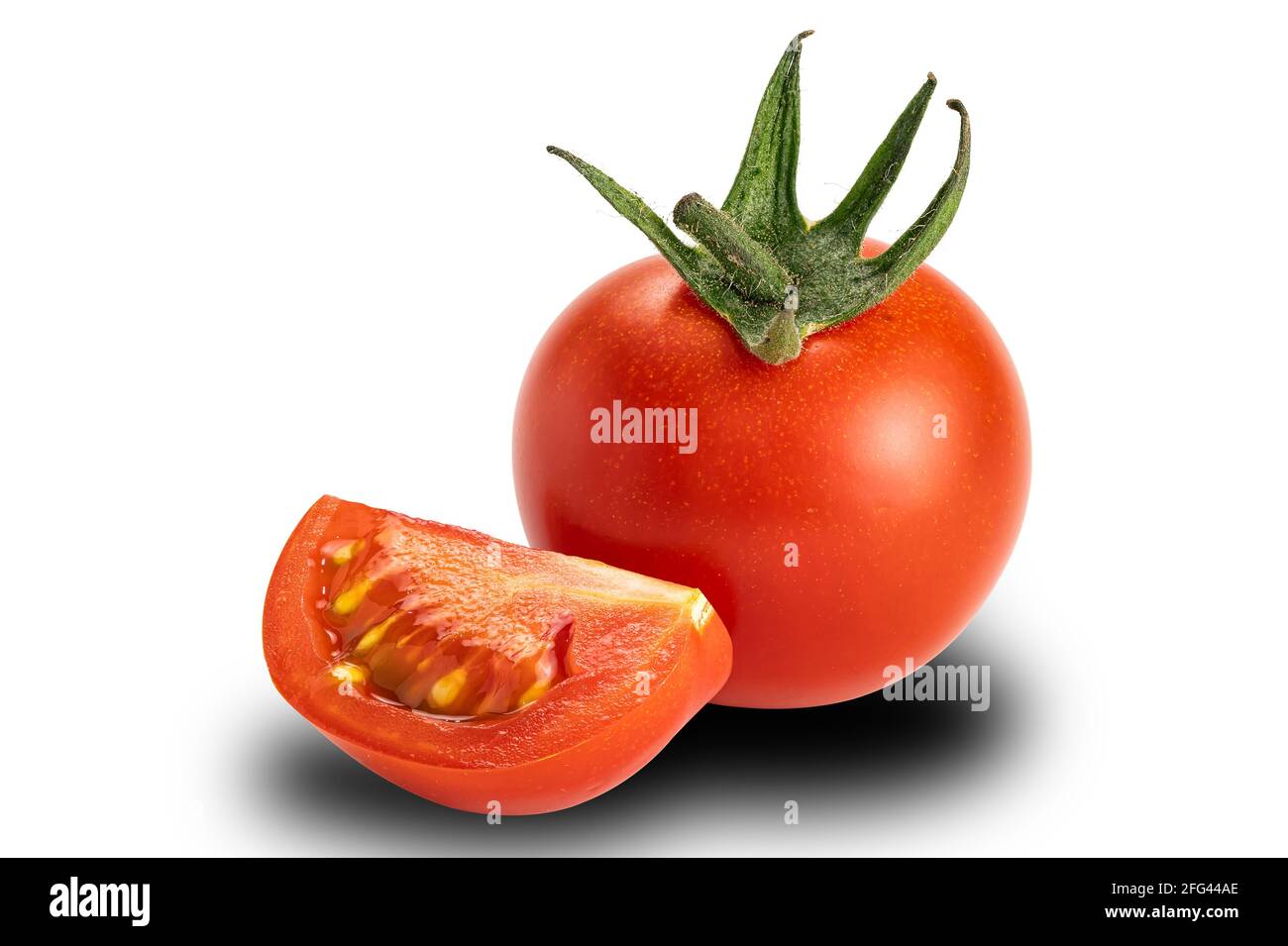 Side view a whole and a piece of cherry tomato on white background. Tomatoes or Solanum lycopersicum or lycopersicon esculentum are source of the anti Stock Photo