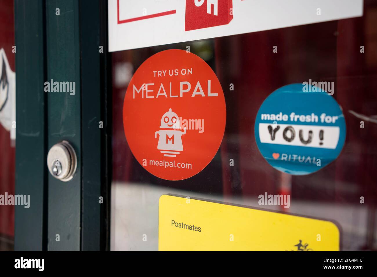 MealPal sticker is seen at a restaurant in downtown Portland, Oregon, on Sunday, April 18, 2021. MealPal is a monthly meal subscription plan. Stock Photo