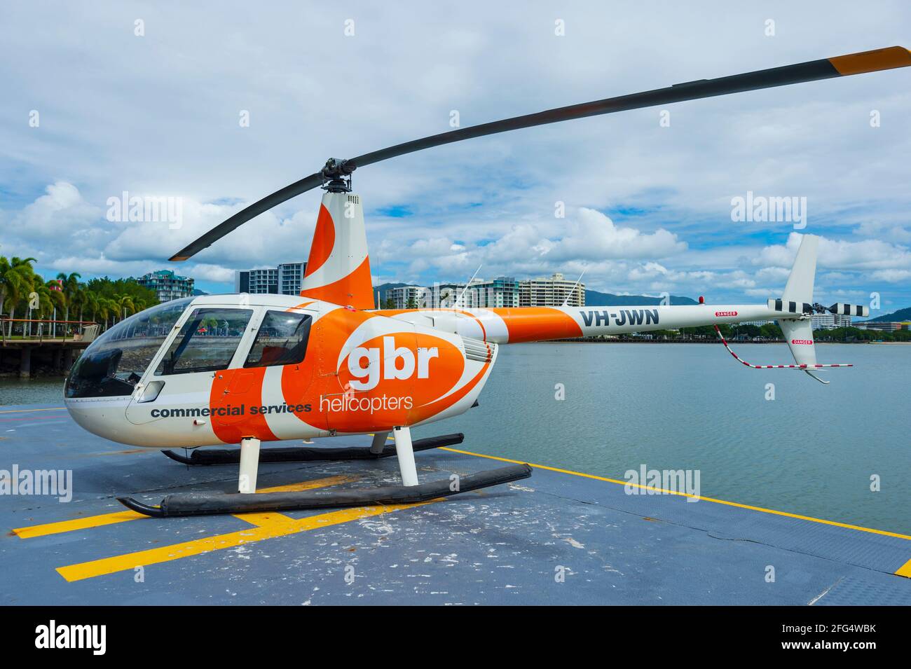 A GBR Robinson R44 helicopter scenic flight on the helipad, Cairns, Far North Queensland, QLD, FNQ, Australia Stock Photo