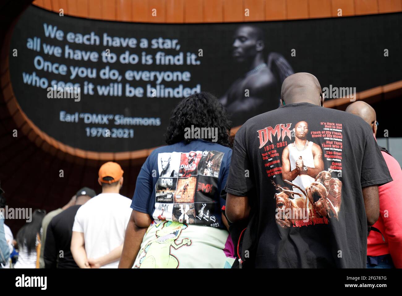 New York, USA. 24th Apr, 2021. People gather to pay tribute to rapper DMX at Barclays Center on April 24, 2021 in the borough of Brooklyn of New York City. Earl Simmons know by his stage name as DMX was highly regarded in the music industry having had five number one albums in a row on Billboard 200. On April 9, 2021 he was pronounced dead having suffered multiple organ failure. (Photo By John Lamparsk/Sipa USA) Credit: Sipa USA/Alamy Live News Stock Photo