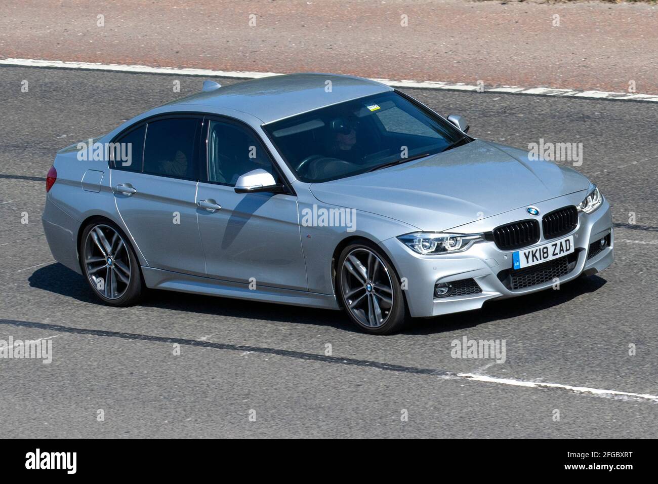 2018 BMW 330D M sport Auto; moving vehicles, cars, vehicle driving on UK roads, motors, motoring on the M6 English motorway road network Stock Photo