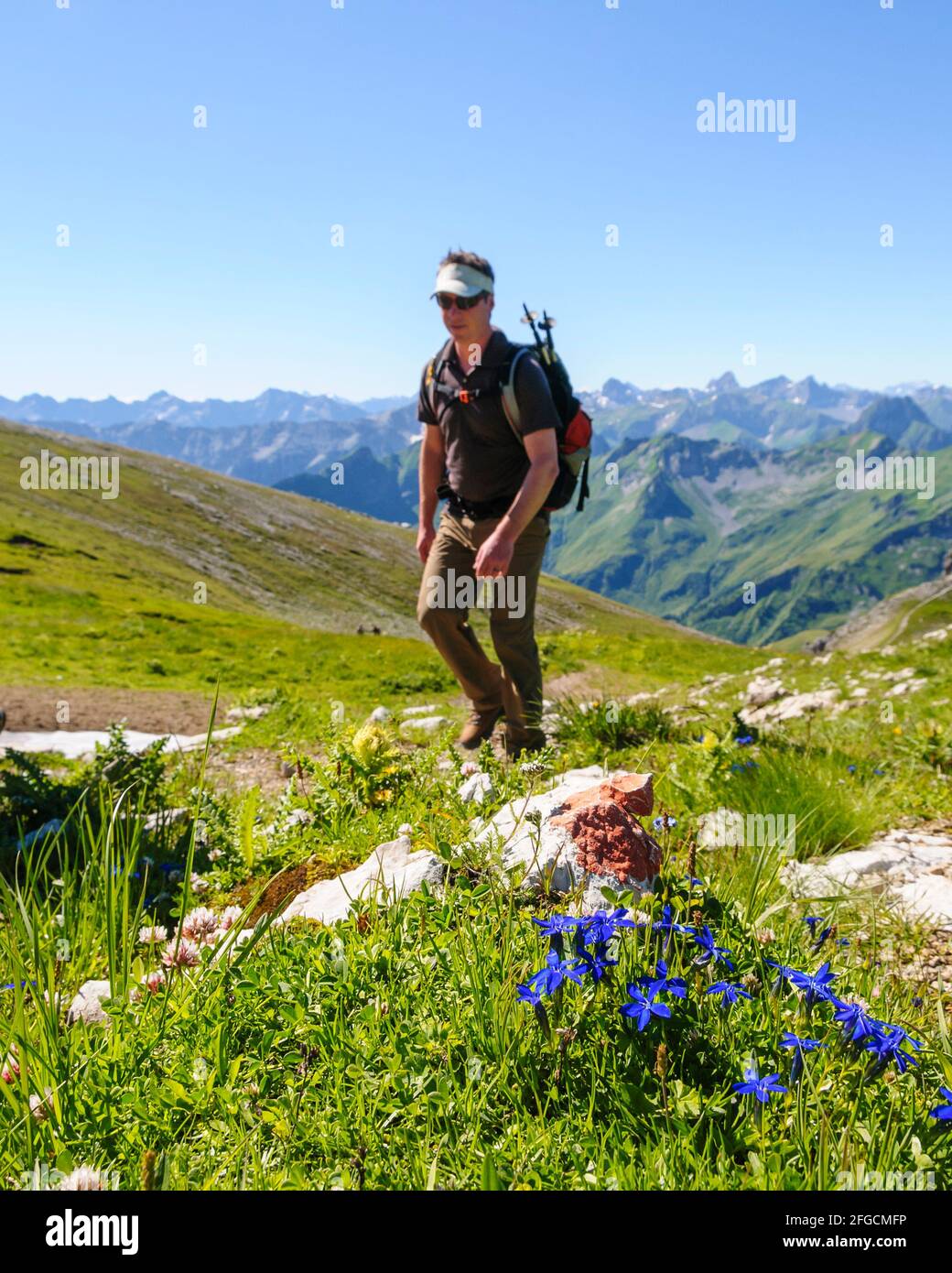 Man on the way in a very lonely part of the Allgäu Alps Stock Photo