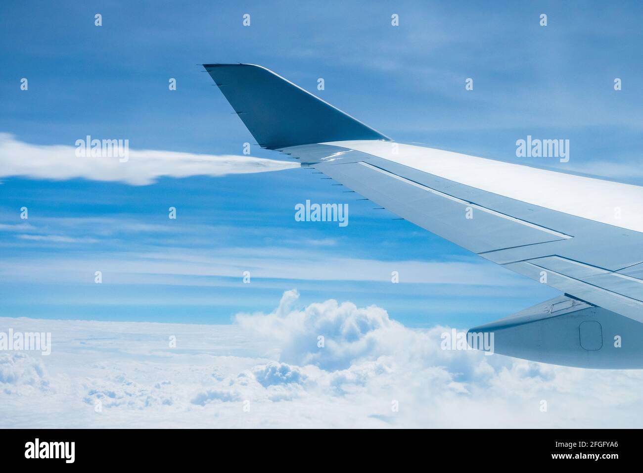 Airliner dumping fuel overboard due to unforeseen circumstances - preparations for immediate return back to the airport (emergency / priority landing) Stock Photo