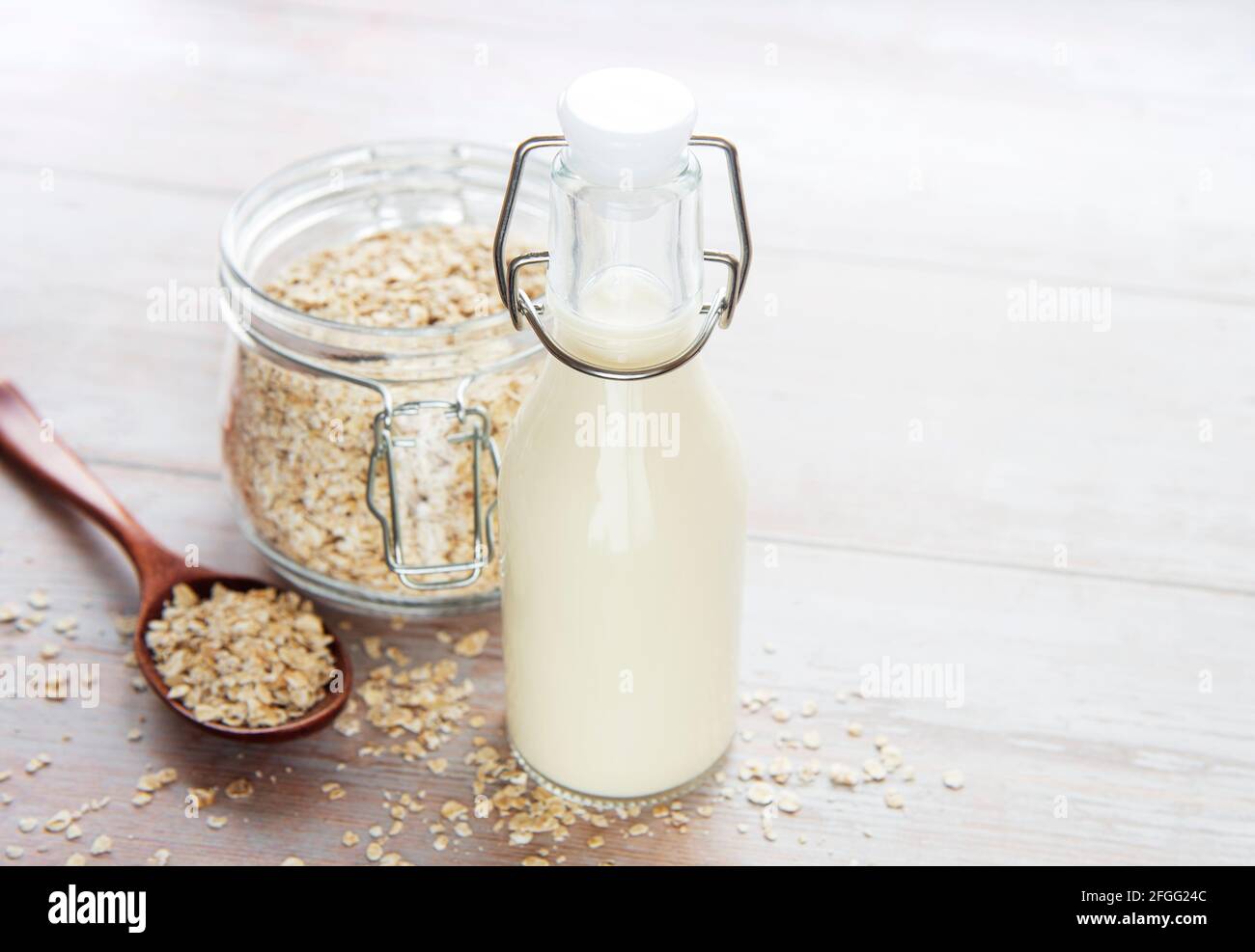 Vegan non dairy alternative milk. Oat flakes milk Stock Photo