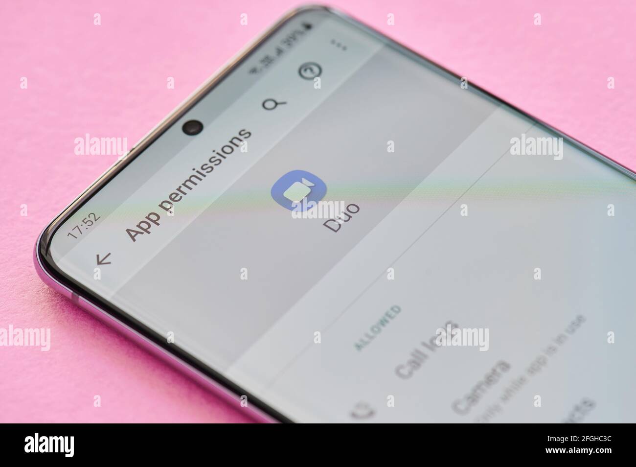 New york, USA - April 23, 2021: Changing permissions setting of google duo app on smartphone screen macro close up view Stock Photo