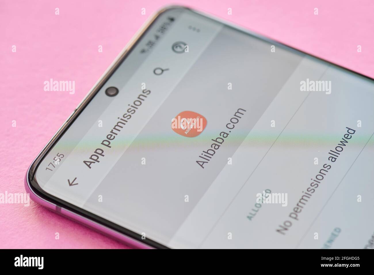 New york, USA - April 23, 2021: Changing permissions setting of Alibaba app on smartphone screen macro close up view Stock Photo